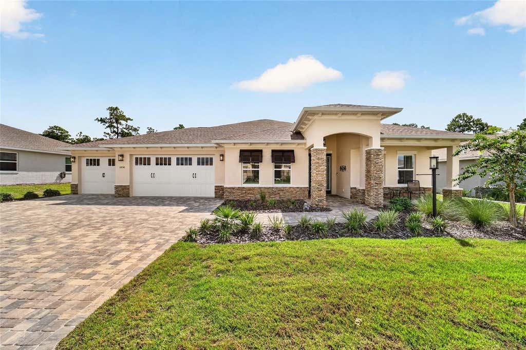 Photo of 10050 SW 106th Circle, Ocala, FL 34481 (MLS # OM730623)