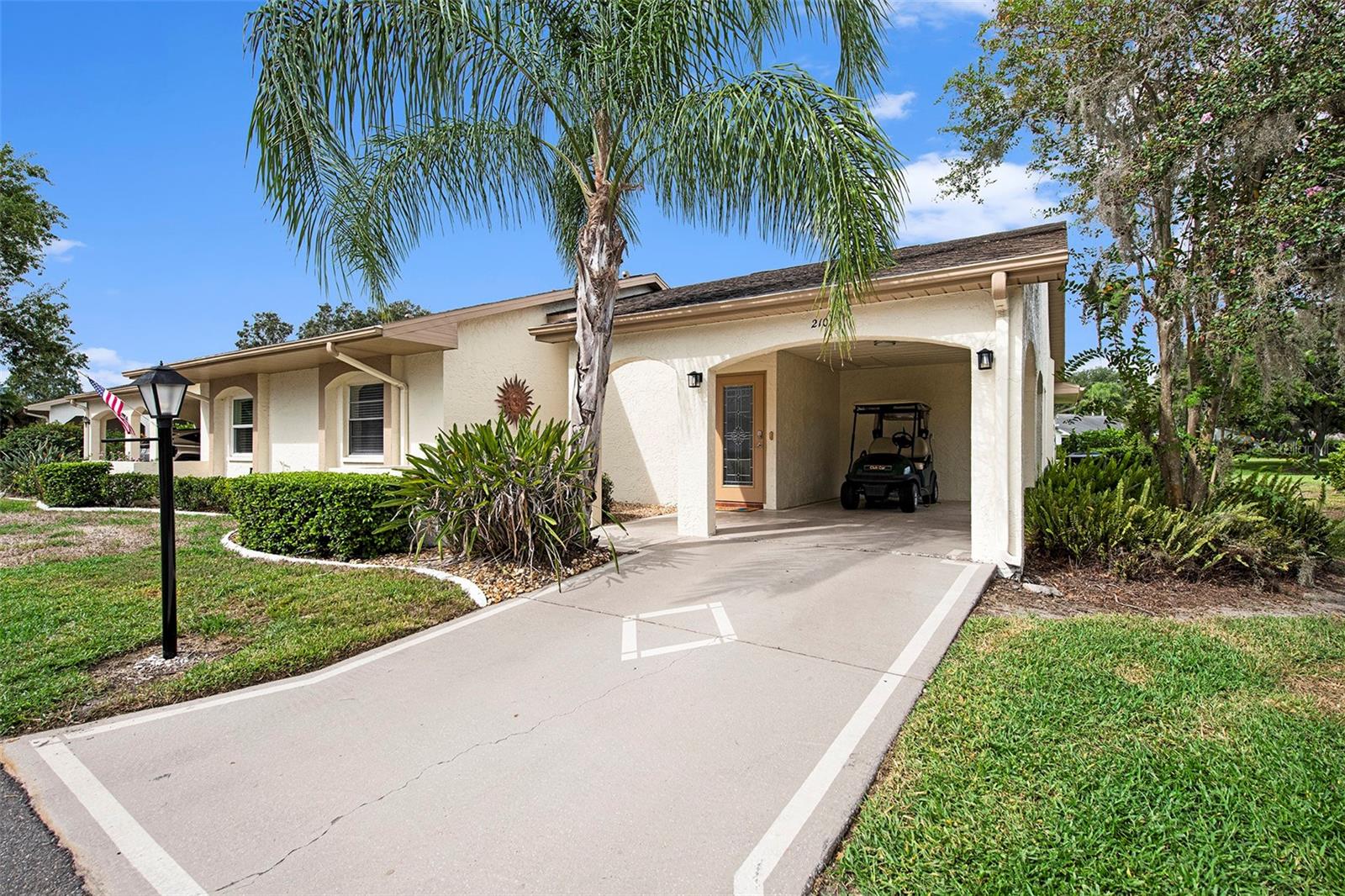 Discover the epitome of RESORT-STYLE living at Kings Point Retirement Community, where your every day feels like a vacation. This vibrant community boasts an incredible array of amenities, including numerous clubs, tennis courts, pickleball courts, SIX sparkling pools, well-appointed clubhouses, winding nature trails, a fantastic restaurant, and a calendar filled to the brim with activities. It's an abundant life, right at your doorstep, a hub for socializing and leisure. Security and peace of mind come standard with 24-hour guard-gated protection. Plus, your maintenance is taken care of, and you're covered by the Kings Point Warranty Service, making homeownership a breeze. Residents enjoy the added convenience of FREE public transportation, ensuring you can explore the area with ease. In this golf cart-friendly community, you'll find designated parking for your cart—a fun and eco-friendly way to get around. Nestled in a tranquil cul-de-sac, this end unit is bathed in natural light, creating a welcoming ambiance throughout. Freshly painted walls and newer floors lend a modern touch, while the brand- NEW refrigerator in the kitchen adds a dash of convenience. One of the standout features of this home is the LARGE, FULLY ENCLOSED Florida room, offering a serene green belt view. It's the ideal space for enjoying the outdoors while staying comfortable year-round. And if the call of the beach beckons, you'll be delighted to know that you're less than 30 minutes away from the nearest sandy shores. It's the perfect complement to your idyllic Kings Point lifestyle. Don't miss out on this incredible opportunity to experience the ultimate in active adult living. Embrace the Kings Point lifestyle and all the remarkable features this end unit has to offer. Your slice of paradise awaits!