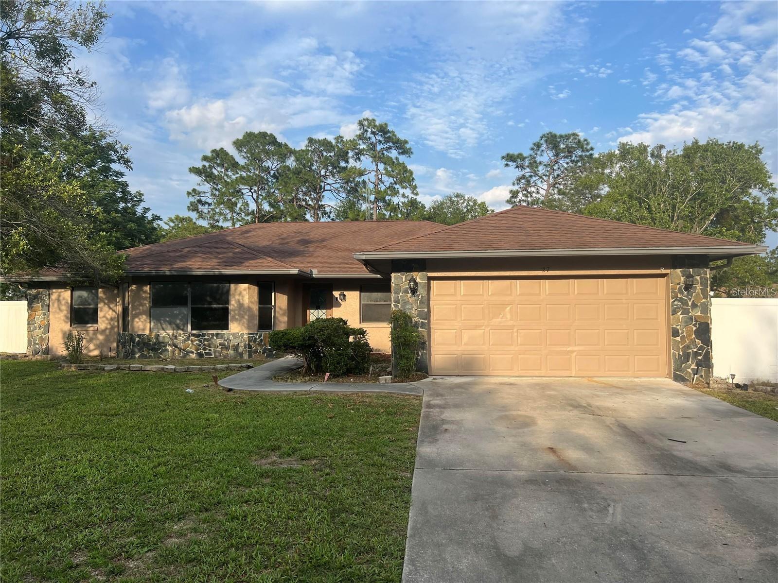 Move in ready by end of August. Perfect work from home house w/ den/office on a large corner lot. Updated with NEW QUALITY KITCHEN WITH GRANITE COUNTERS, SOFT CLOSE HINGES, AND DRAWERS, STAINLESS STEEL APPLIANCES. Wood laminate and ceramic tile floors throughout....NO CARPETS! New Ac, New Garage Door opener, Property is all fenced with vinyl Fence. This home has many spaces that may be converted to rooms. Home is in the cleaning & touch up process. Seller is willing to lease the property for a year with options to buy.
