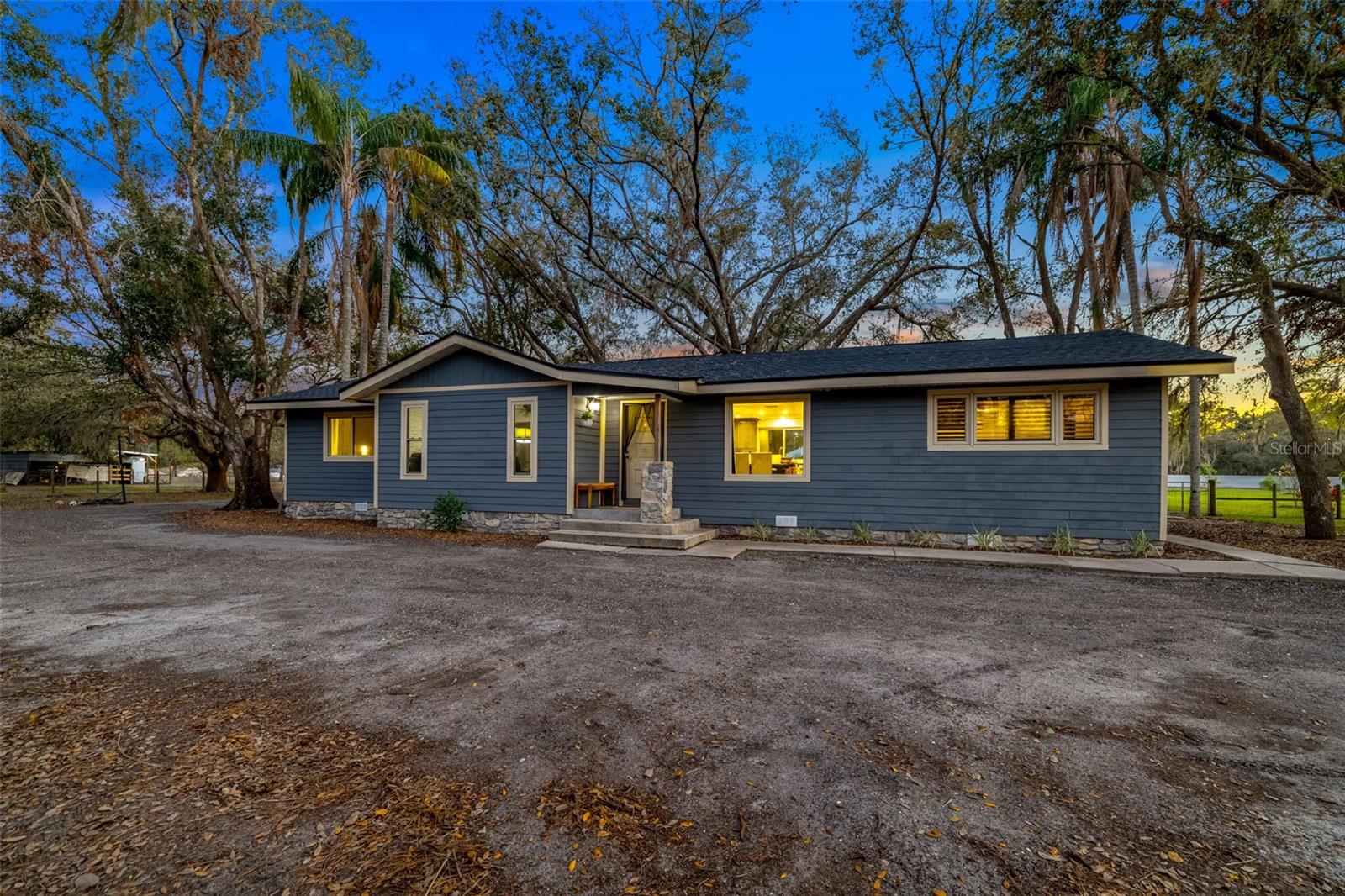 Stunning 4-Bedroom Home on Rare 5-Acre Lot in the Heart of Parrish
Land is becoming scarce, and 5-acre parcels are even rarer. This exceptional 4-bedroom, move-in-ready home sits on a sprawling 5 acres, offering a private oasis right in the center of Parrish—no need to travel miles out on SR 62 or to Myakka. Live in your own castle with endless possibilities!
Property Highlights:
Spacious 5-Acre Lot: Perfect for a family compound. New Manatee County rules allow up to 3 homes on 5+ acres with no HOA restrictions.
Move-In Ready Upgrades:
New roof
Tankless hot water heater
New water system
New electrical box
New undercarriage insulation
New AC
Flood Zone X: No flooding concerns, ensuring peace of mind.
Versatile Outdoor Space: Ideal for building famiyn memories as they play, fish in the pond, or enjoy football in the open fields. Host barbecues, play music, and entertain without noise complaints.
Room for Animals and More: Raise chickens, goats, or even a cow. Perfect for a garden to grow your own produce.
Business-Friendly: Park work trucks or equipment on your property with ease.
Relax in Style: Unwind in the luxurious clawfoot tub after a long day.
Prime Location:
Conveniently located near I-75 via Moccasin Wallow Rd, commuting to Sun City, St. Petersburg, Sarasota, or Tampa is effortless. Yet, this property offers a serene retreat from the hustle and bustle, providing the best of both worlds.
Your Dream Lifestyle Awaits:
Imagine a life where you can enjoy wide-open spaces, pursue your hobbies, and create lasting memories with family and friends. With rising grocery prices, start your own garden and embrace a sustainable lifestyle.
Don’t miss this rare opportunity! Call today for your private showing and make this 5-acre paradise your forever home.