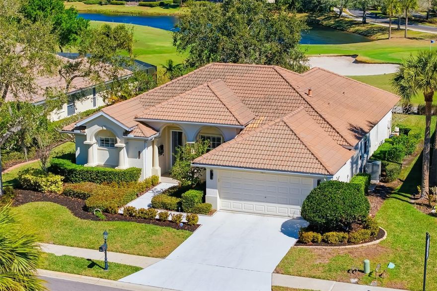 Imagine yourself living in this sophisticated "CITY CHIC" home while residing in Bradenton's only Golf & Boating community! Designed with the elevated style of a metropolitan flat, the home has been intelligently reconfigured to prioritize modern utility and flow. Strategic updates include utilizing a part of the golf cart garage, which was wisely utilized to add 54 square feet, enhancing the pantry and laundry room with custom functionality. Redefining the social space, removing a wall opens the room to allow the kitchen to serve as the heart of the home; additionally, the traditional dining room has been transformed into a quiet library and sitting room. Updated flooring extends throughout, complemented by a new fireplace and chimney wall. Both bathrooms have been fully renovated and feature quartzite counters. Outdoor living is defined by a private pool and spa featuring a newer surface and a refreshed paver deck, perfect for an evening of enjoyment. 
Located just steps from the first green, this property offers immediate access to the Waterlefe Golf Club, a par-72 championship course that has hosted the U.S. Open Local Qualifier an unprecedented eight times. As a resident, you gain access to the River Club at Waterlefe, which recently underwent significant renovations. Amenities include resort-style riverfront dining, a full-service restaurant, and a poolside Tiki Bar. For those focused on fitness, the "#lefelife" offers a 24/7 fitness center with state-of-the-art equipment and a fitness studio offering weekday classes led by a trained coach. Just beyond the gym sits a Junior Olympic-sized saline swimming pool and a Tiki Bar where you can enjoy a tropical drink and a light bite while soaking in the sun's rays. 
Waterlefe also offers a 59-slip marina with direct access to the Manatee River and the Gulf of Mexico—a rarity much appreciated by residents. Discover the hallmark of the #lefelife in a community that blends championship golf with a world-class marina lifestyle. Please note that taxes include the CDD fee and that this home is exempt to finance charges associated.