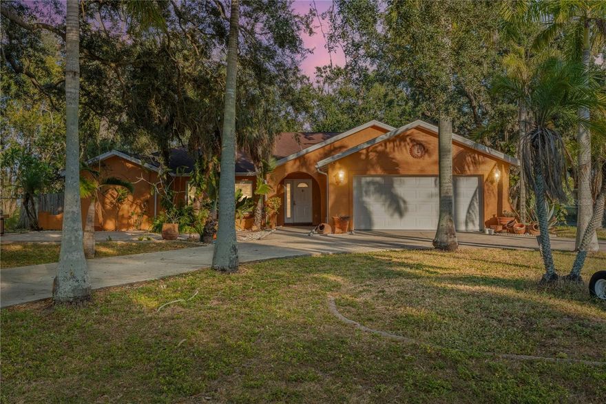 Is this a full acre home less than one minute from the public boat ramp? YES IT IS! Boasting only one owner from the moment it was custom built, the floor plan thoughtfully designed w/multiple expansive living areas. An incredible & rare opportunity to expand, enhance, or simply enjoy the exclusivity of owning a full acre less than ten minutes from downtown, a short drive to the world renowned beaches of Anna Maria Island and Long Boat Key. The location is unbeatable even for a commuter 7 minute drive to interstate and highways. The enclave spans a sun room, a cabana bath, a working fireplace, wall to wall closets, a welcoming breakfast nook met with bay windows & plantation shutters. Corian countertops, gas water heater! A detached workshop w/plumbing & electricity. CBS. One of its kind,