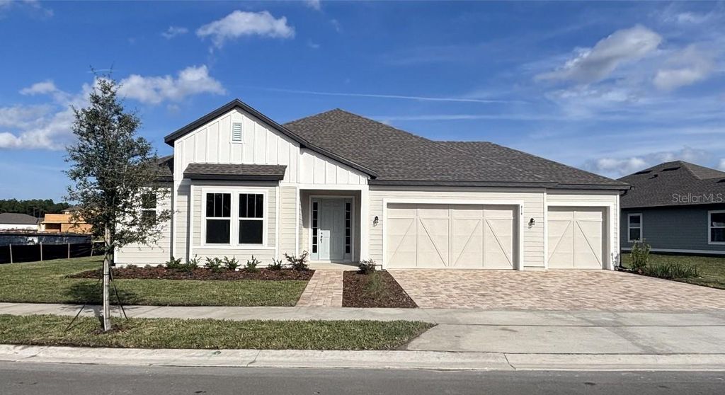 Photo of 414 Junonia Blvd, New Smyrna Beach, FL 32168 (MLS # TB8447633)