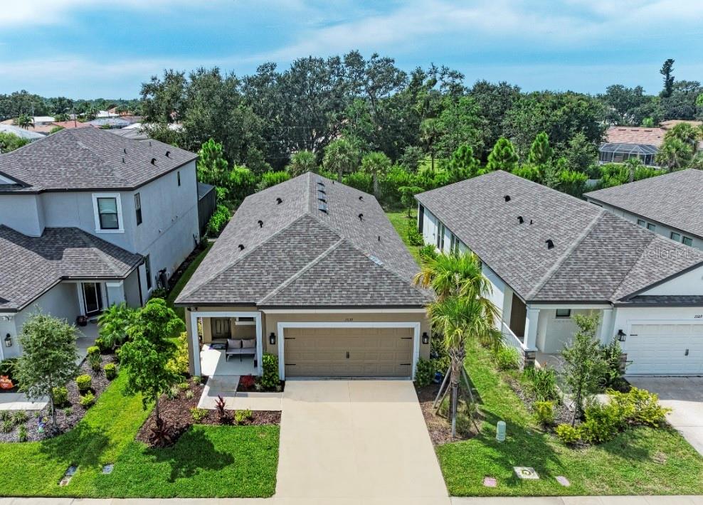 In the heart of Nokomis, discover a home designed for today’s lifestyle with the luxury of tomorrow already built in. Located in Palmero, a gated community completed in August 2025, this residence blends modern construction, thoughtful upgrades, and access to exceptional amenities just minutes from Gulf Coast beaches. Built in December 2023, Taylor Morrison’s St. Vincent model offers 3 bedrooms plus a versatile bonus room with French doors ideal for a home office, media lounge, or guest space. The open floor plan is highlighted by soaring 8’ interior doors, elegant tray ceilings, and walls of windows that invite natural light throughout. A gourmet kitchen with gas range anchors the main living area, while the seamless transition to a screened lanai expands the space for year-round indoor, outdoor living. Upgrades were chosen with long term value in mind, including a 90 AMP prewire for a future pool and spa, EV charging power adapter in the garage, and a flexible floorplan designed for changing needs. Life in Palmero offers more than just a home, it’s a lifestyle. Residents enjoy a heated resort style pool and spa, splash pad. Beyond the gates, the best of Sarasota County is at your doorstep. Drive just 10 minutes to Nokomis and Venice beaches, 20 minutes to Siesta Key, and 25 minutes to downtown Sarasota and St. Armands Circle. University Town Center’s shopping and dining are only 25 minutes away, SRQ International Airport is 30 minutes, and Tampa International Airport can be reached in just over an hour. For those who love exploring the coast, Anna Maria Island is about an hour’s drive, making day trips effortless.
This home offers the rare blend of new construction, thoughtful upgrades, resort amenities, and proximity to world-class destinations, positioning it as one of Palmero’s most desirable opportunities.