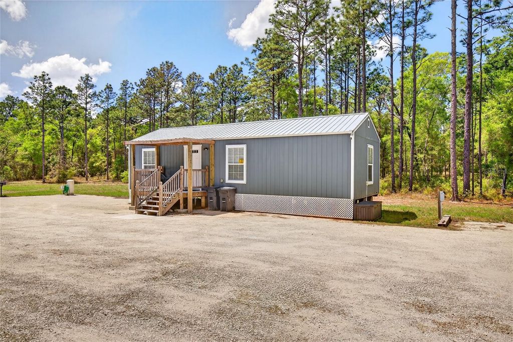 Photo of 7576 N Heller Avenue, Dunnellon, FL 34433 (MLS # OM722207)