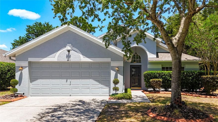 Welcome to this beautifully updated 4 bedroom home on a desirable corner lot, perfectly positioned next to a peaceful green space and directly across from a charming clock tower park! Inside, you’ll find a well-designed split floor plan with real wood flooring throughout the living areas and bedrooms. The kitchen features newer granite countertops and a very nice stainless range with five gas burners! The spacious primary suite offers a relaxing garden tub. Additional highlights include epoxy-coated garage flooring and a LARGE 24x10 screened-in patio—perfect for enjoying Florida living year-round. Step outside and take in serene views of fruiting passion vines from your backyard with a recently replaced beautiful privacy fence, or relax on the patio just beyond the large sliding glass doors. The setting offers both privacy and a connection to nature, with beautiful mature trees and park spaces just steps away. Both the roof and HVAC were replaced in 2023, and the home has even been inspected!  A 4 point inspection from 04/2026 is available!  The sellers—an active military family—have truly enjoyed this home and community, but continuing to serve our country means they need to make another move, opening up this home to the right buyer! Residents enjoy an impressive list of amenities, including a clubhouse, fitness center, multiple pools, splash pad, tennis and basketball courts, playgrounds, dog parks, and frequent community events. Conveniently located near Publix, the newest YMCA in the Tampa area, I-75, US-41, US-301, and St. Joseph’s Hospital South, this home offers both comfort and accessibility. Community residents love the proximity to MANY great school options including multiple charter and magnet schools very close by!  Apollo Beach Nature Preserve and The Manatee Viewing Center are also just a few minutes away! Bonus: Located in a USDA-eligible area, offering the potential for $0 down financing for qualified buyers! Only ONE buyer will get to call this home their own—schedule your private tour today!