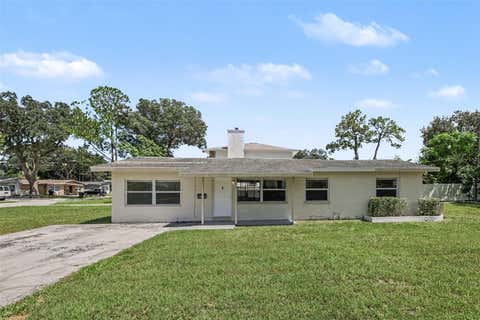 Photo of 5585 Atlantic Avenue N, St Petersburg, FL 33703 (MLS # O6433664)