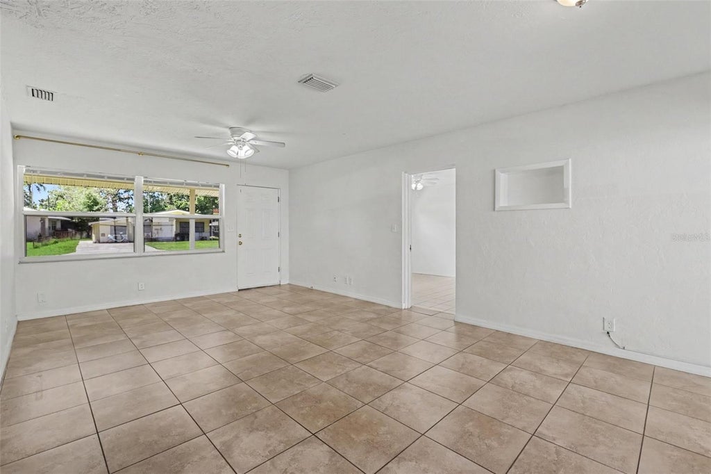 Photo of 5585 Atlantic Avenue N, St Petersburg, FL 33703 (MLS # O6433664)