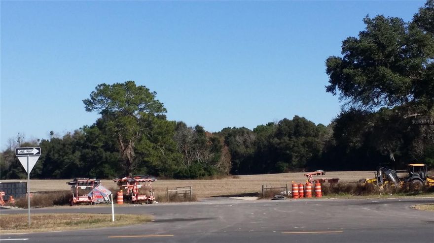 The site is a total of 52.68 +/- acres, consisting of 3 parcels (18.28 acres zoned CI, 24.29 acres zoned ILW, and 10.11 acres zoned I). Property may be divided into smaller parcels, pricing based on size/shape/frontage/etc. Property is in an excellent location within the cvity of Alachua, located between Gainesville and alachua. It is located in the growing bioscience community which includes neighboring Progress Park, Foundation Park, an Copeland Park. FDOT approved driveway is in place including costly accel and decel lanes, resulting in significant development cost savings and access to the 18,000 vehicles that travel Hwy 441 daily. The site is approx. 4 miles east of I-75 and minutes from both downtown Alacvhua and Gainesville. This location has sought after zonings in place (CI, I, ILW) with many development possibilities and much flexibility. Ideal for retail, office, industrial, manufacturing, and warehouse uses. Access to utilities is readily available.