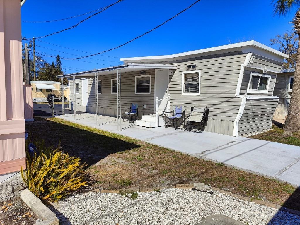 Located Cotee river mobile Home Park, Three blocks from New Port Richey which is golf cart friendly, 1/2 block from grand Blvd. park on cotee river where you can fish. 55 plus small park and you own land, HOA Includes trash water- lawn. Place is restored better than new, slate floor- tons of storage, two-bedroom 3 beds. New 75 inch smart TV with alexia completely furnished all you need is clothes and towels. Newport richey is full of concerts and parades and Port Richey theater with many shows, also has Sims park by the river. Legion and eagles less than a mile away, not much traffic in town. Walmart, Publix and Lowe's and tons of eating places less than 3 miles away. This place has plenty of parking space and dual Rd. access