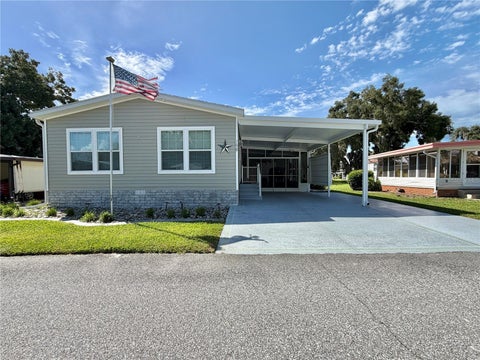 Photo of 198 Jacaranda Drive, Leesburg, FL 34748 (MLS # G5118541)