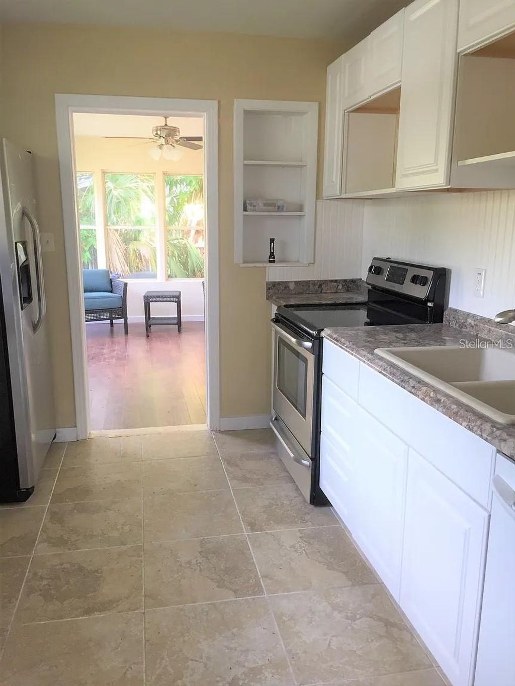 Photo of 762 60th Avenue NE, St Petersburg, FL 33703 (MLS # OM718217)