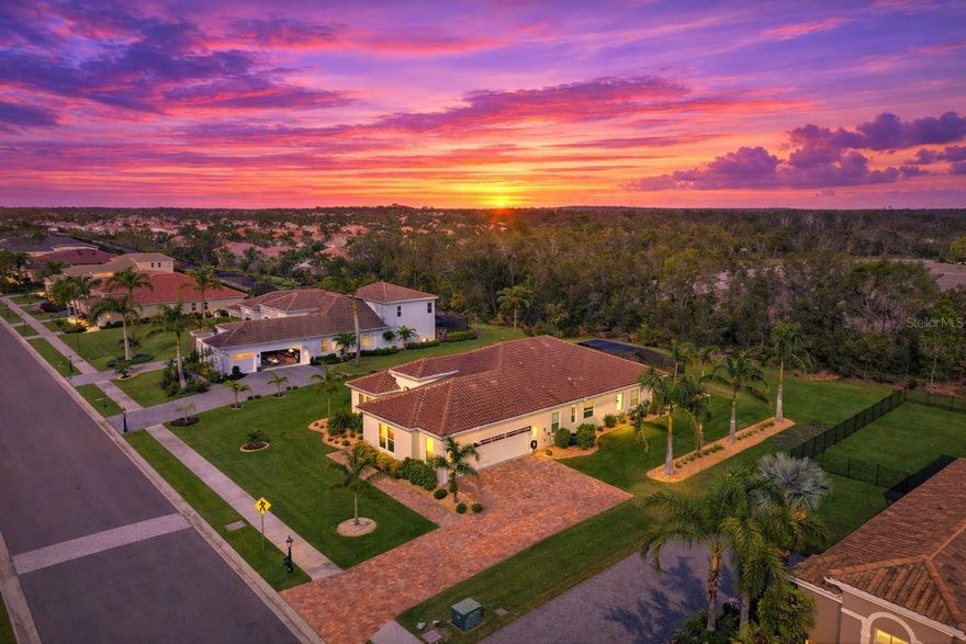 MOTIVATED SELLERS! Exquisite home located in the highly desirable Rye Wilderness Estates. Situated on a spacious ½-acre homesite, this beautifully maintained residence offers exceptional curb appeal with lush, professionally manicured landscaping, fully fenced. Enjoy the benefits of NO CDD fees, low HOA fees, and access to top-rated “A” schools in East Manatee County. This elegant home features 3 bedrooms, 3.5 baths, plus a private den perfectly suited for an office or workspace. The oversized 3-car side-entry garage is among the largest in the neighborhood, offering ample storage and versatility. Tile flooring flows throughout the main living areas and den/office. The gourmet kitchen includes granite countertops, solid wood cabinetry with pull-out drawers, decorative vented hood, tiled backsplash, under-cabinet lighting, center island, and stainless steel appliances. The kitchen opens to the spacious great room, creating an ideal layout for entertaining. Impact-resistant sliding glass doors lead to an extended lanai featuring a heated pool and covered outdoor living area with convenient pool bath and plumbed for outdoor kitchen. The primary suite offers a luxurious ensuite bath with large walk-in shower, dual vanities, garden tub, generous walk-in closets, complete with direct patio access. The second bedroom also includes its own en-suite bath, making it an ideal second primary suite. Additional features include 8' doors, large laundry/utility room with cabinetry and walk-in storage closet, and rain gutters throughout. New water heater installed in 2025. Conveniently located approximately 15 minutes to I-75, 30 minutes to Gulf beaches, 5 minutes to Manatee State Park, and adjacent to Rye Preserve. Close to UTC shopping, dining, entertainment, Lakewood Ranch, Sarasota, St. Petersburg, and Tampa.