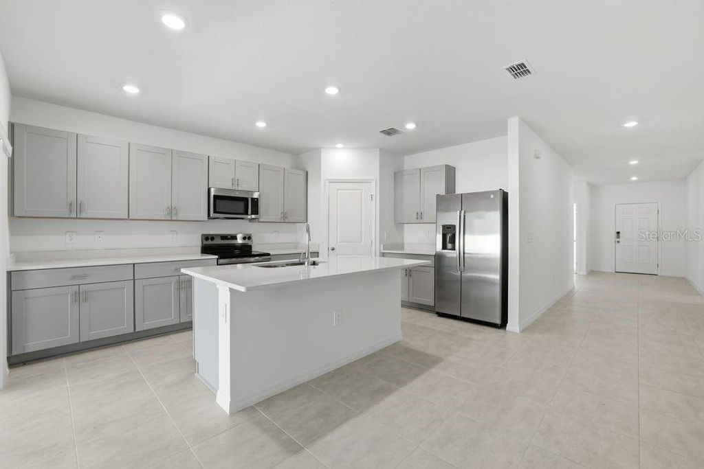 Photo of 13514 Tropical Breeze Way, Hudson, FL 34669 (MLS # TB8437937)