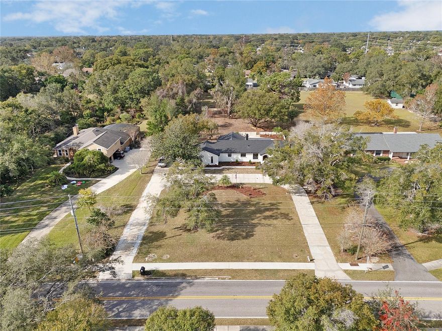 Welcome to 1450 W Lake Brantley Rd, a beautifully renovated home designed for today’s modern lifestyle. Thoughtfully updated throughout. Designed to complement a refined lifestyle, this home offers effortless everyday living with the flexibility to entertain guests with elegance. Offering This is a rare opportunity in Longwood, featuring an exceptional 1.58-acre lot with no HOA and direct backyard access to the Seminole Wekiva Trail. Enjoy unmatched privacy, exclusivity, and the convenience of nature right outside your door. The open-concept kitchen flows seamlessly into the dining area and two spacious living rooms, extending into a versatile flex space—ideal for entertaining or relaxing. Outdoors, the sparkling pool offers plenty of room for morning laps, afternoon lounging, and unforgettable gatherings. Additional highlights include a new well water pump with no water bill, a new roof (2025), tankless water heater (2024), HVAC (2025), electrical upgrades (2025), and a sprinkler system upgrade (2025)—all providing peace of mind and efficiency. Living here means embracing the best of the Central Florida lifestyle. Step into your backyard and explore 7 miles of the Seminole Wekiva Trail, connecting to a 22-mile adventure for biking, and enjoying the outdoors. This one-of-a-kind property truly offers space, privacy, and lifestyle in one exceptional package.