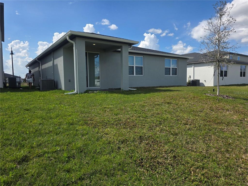 Photo of 5009 Katrina Drive, Haines City, FL 33844 (MLS # O6397648)
