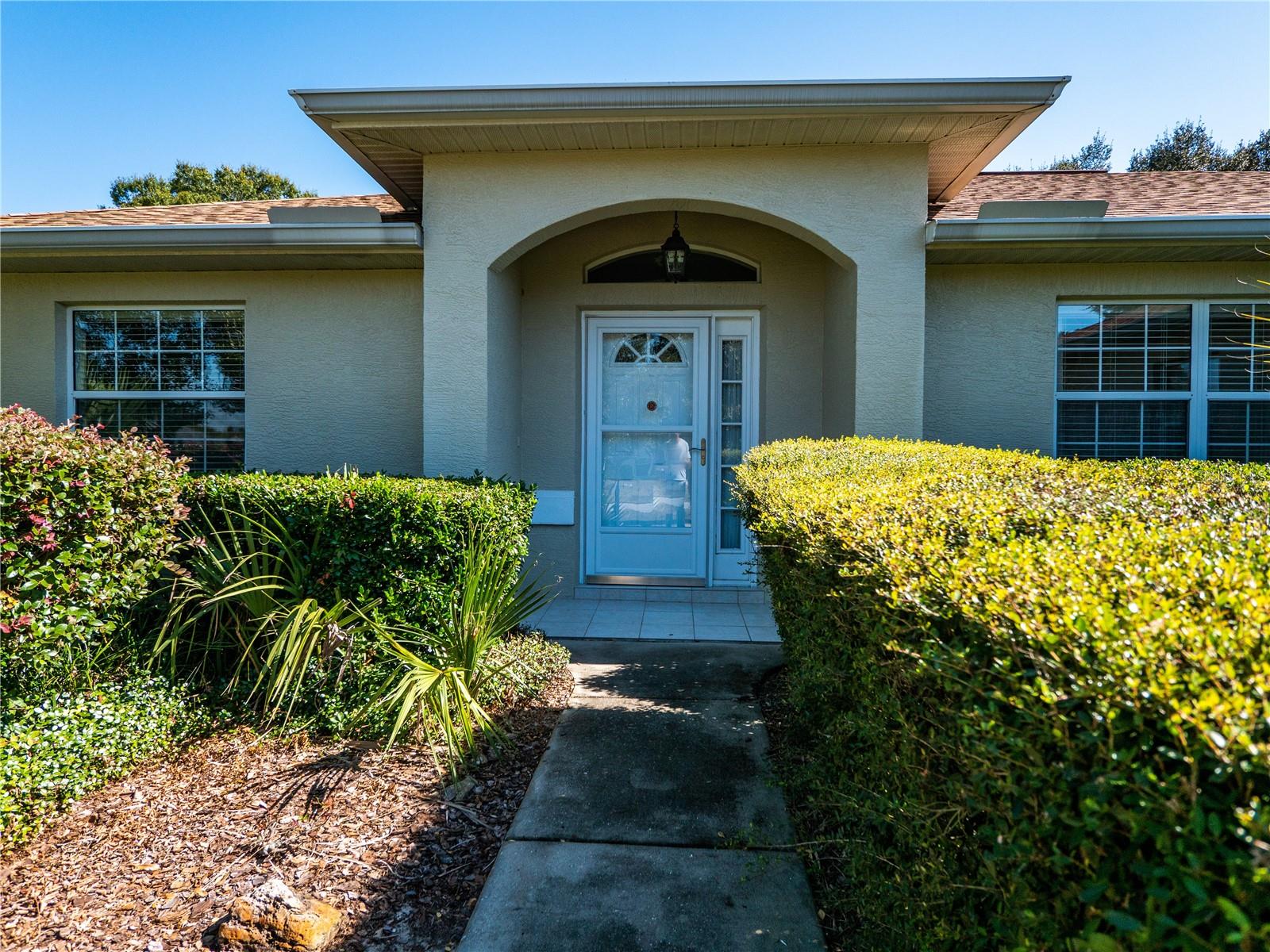 Are you looking for a 55+ Community with low HOA fees?? Well maintained and move-in ready home nestled in the community of Quail Meadow, just minutes from downtown Ocala, World Equestrian Center and I75. 15-20 minutes to HITS. Community pool and club house for your use, as well as several organized neighborhood groups for socializing, if you choose. This Triple Crown Home was finished to order for the original owner, who was the only occupent. This is a non pet, smoke free home. Nice open floor plan with eat-in kitchen and separate dining area. Split bedroom plan offers privacy for you and your guests. The home has tiled entries and gorgeous hard wood flooring throught the main living area, kitchen, dining area and master bedroom. The master bedroom with ensuite bathroom, and large, roomy closet, is very spacious and opens to the lanai. The guest rooms have new carpet with a shared bath. Nice laundry room off the kitchen is spacious and convenient. New shingle roof and hot water heater. The attached 2 car garage has plenty of room for your vehicles and extra storage. Irrigation Well and system keep things watered without the added water bill! Enjoy the quaint lanai on the back of the home, which offers a cozy place to start your morning, or a great place to unwind after a long day. Publix, pharmacy, restaurants, banks, hospitals, Golds Gym all convenient and minutes away. Call or text for your appointment to see this special home.