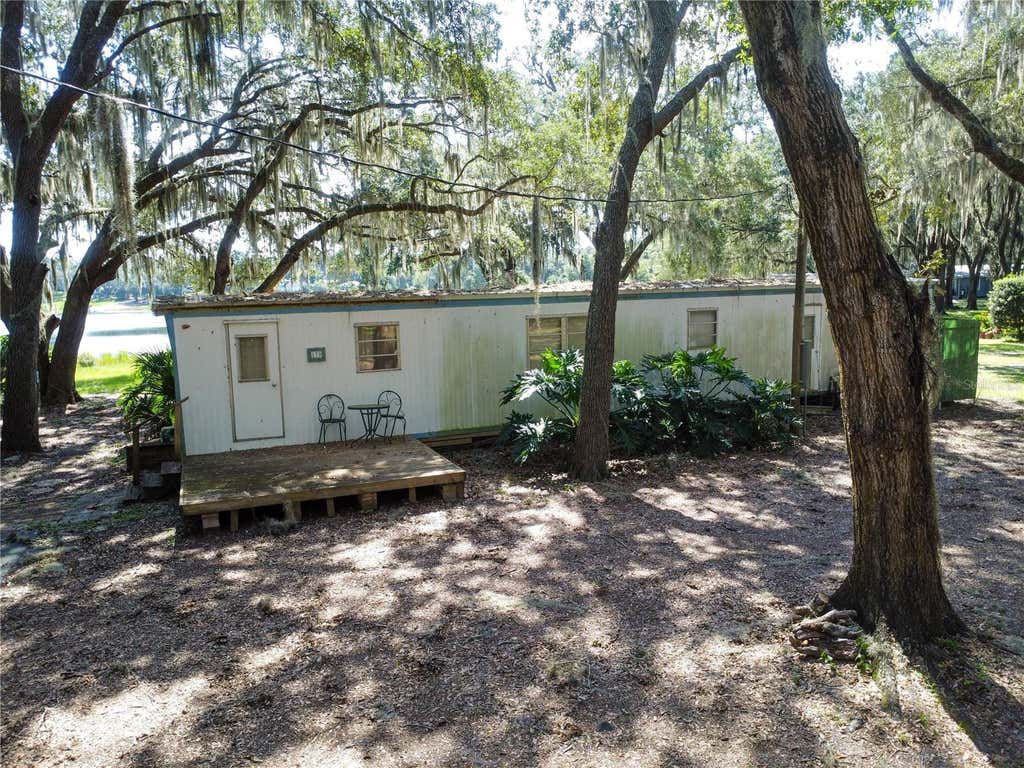 Photo of 170 E Cowpen Lake Point Road, Hawthorne, FL 32640 (MLS # GC542767)