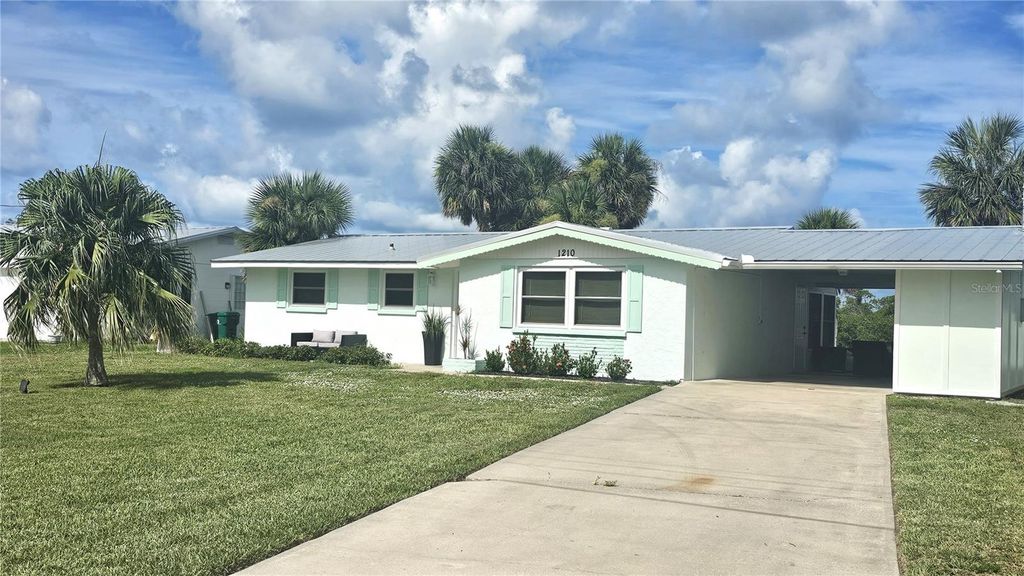 Photo of 1210 S Maryknoll Road, Englewood, FL 34223 (MLS # S5141817)