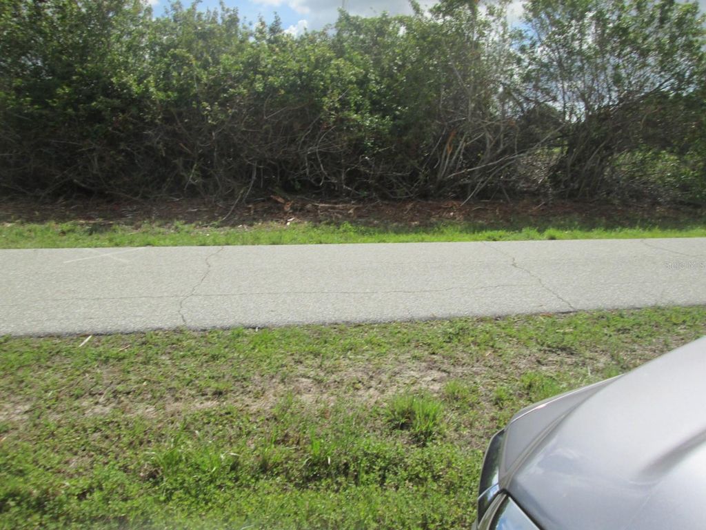 Photo of 6663 Kevitt Boulevard, Port Charlotte, FL 33981 (MLS # C7526711)