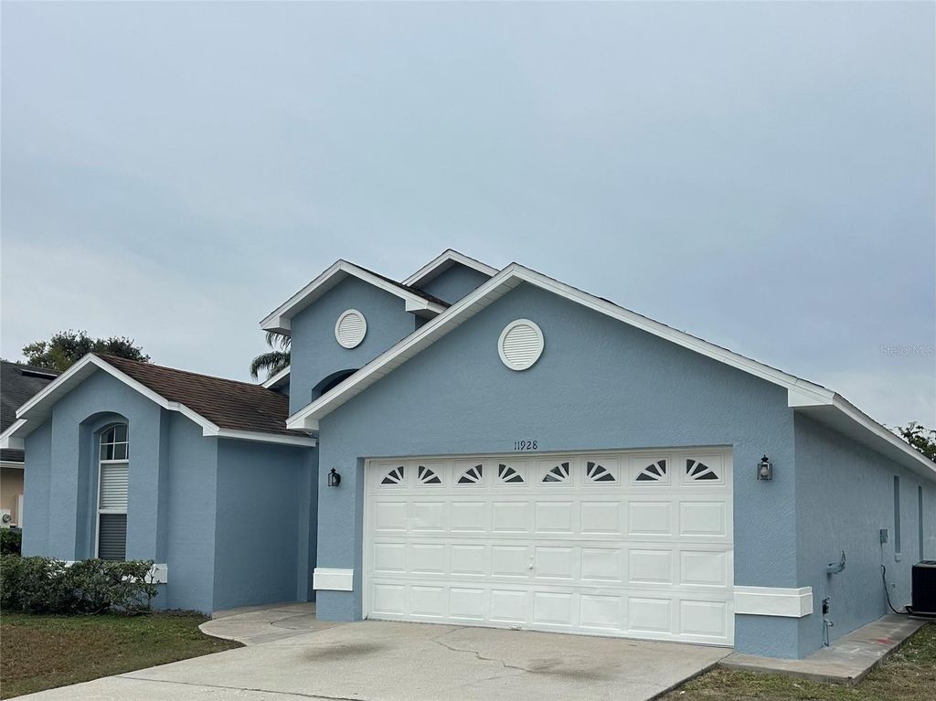 Photo of 11928 Hatcher Circle, Orlando, FL 32824 (MLS # O6378591)