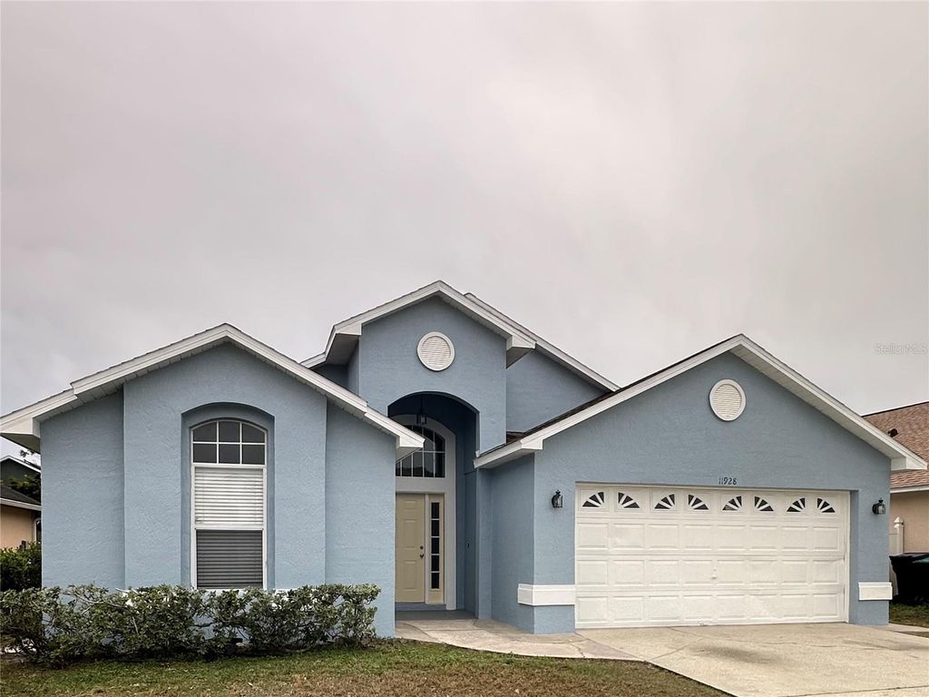Photo of 11928 Hatcher Circle, Orlando, FL 32824 (MLS # O6378591)