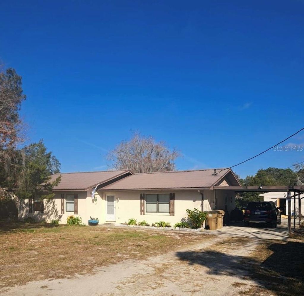 Photo of 11301 Huggins Street, Leesburg, FL 34788 (MLS # S5148654)