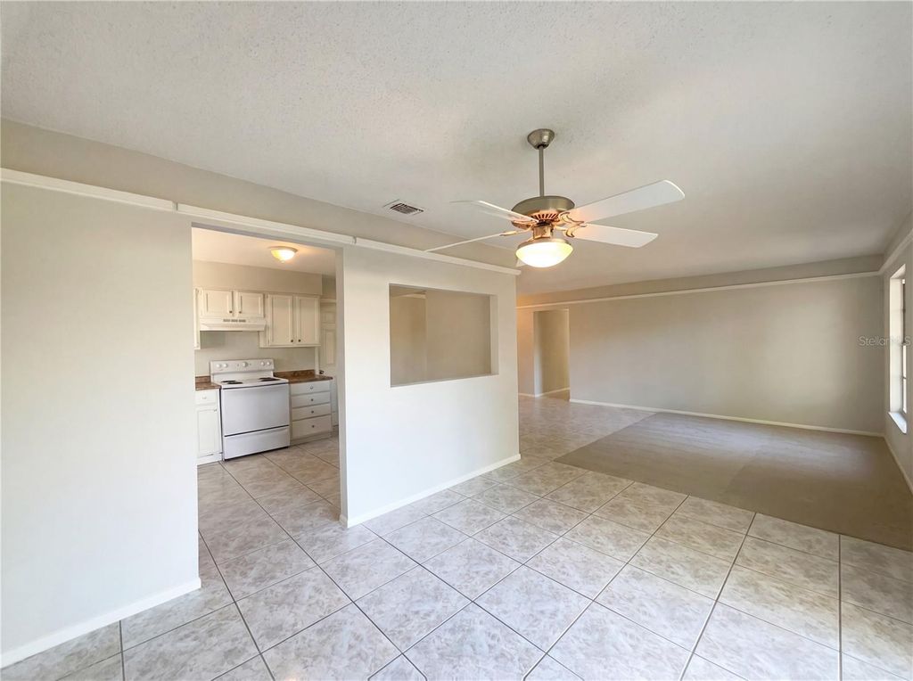 Photo of 6137 Sparling Hills Circle, Orlando, FL 32808 (MLS # O6378374)