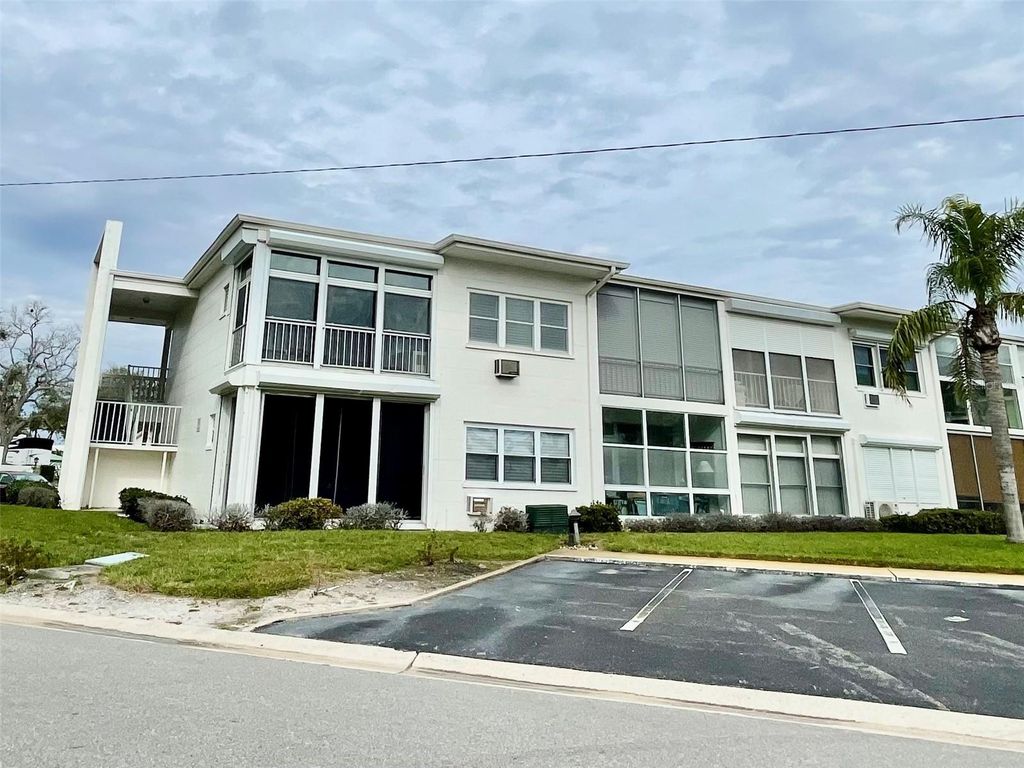 Photo of 7050 Sunset Way #19, St Pete Beach, FL 33706 (MLS # A4681084)