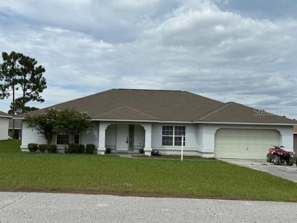 Photo of 8509 SW 136th Loop, Ocala, FL 34473 (MLS # OM717893)