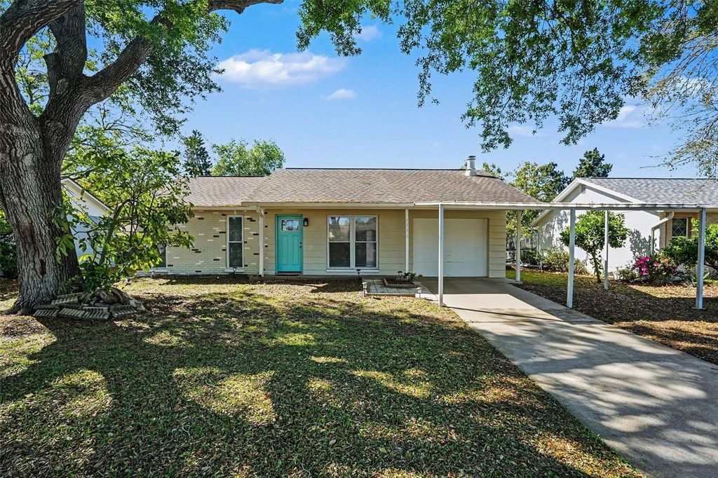 Photo of 7442 Compton Lane, New Port Richey, FL 34655 (MLS # TB8489339)