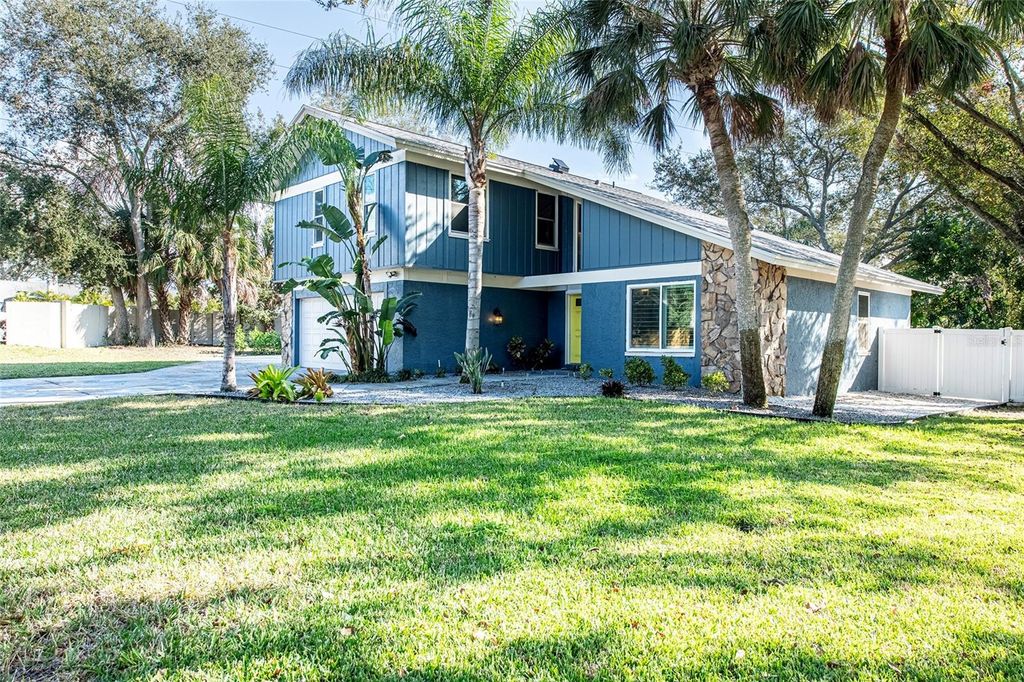 Photo of 1599 Brae Moor Lane, Dunedin, FL 34698 (MLS # TB8462484)