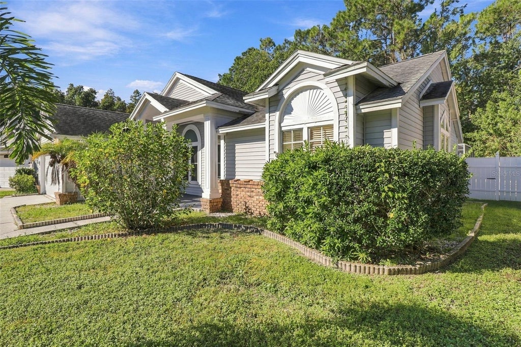 Photo of 7828 Lake Placid Lane, New Port Richey, FL 34655 (MLS # TB8558402)