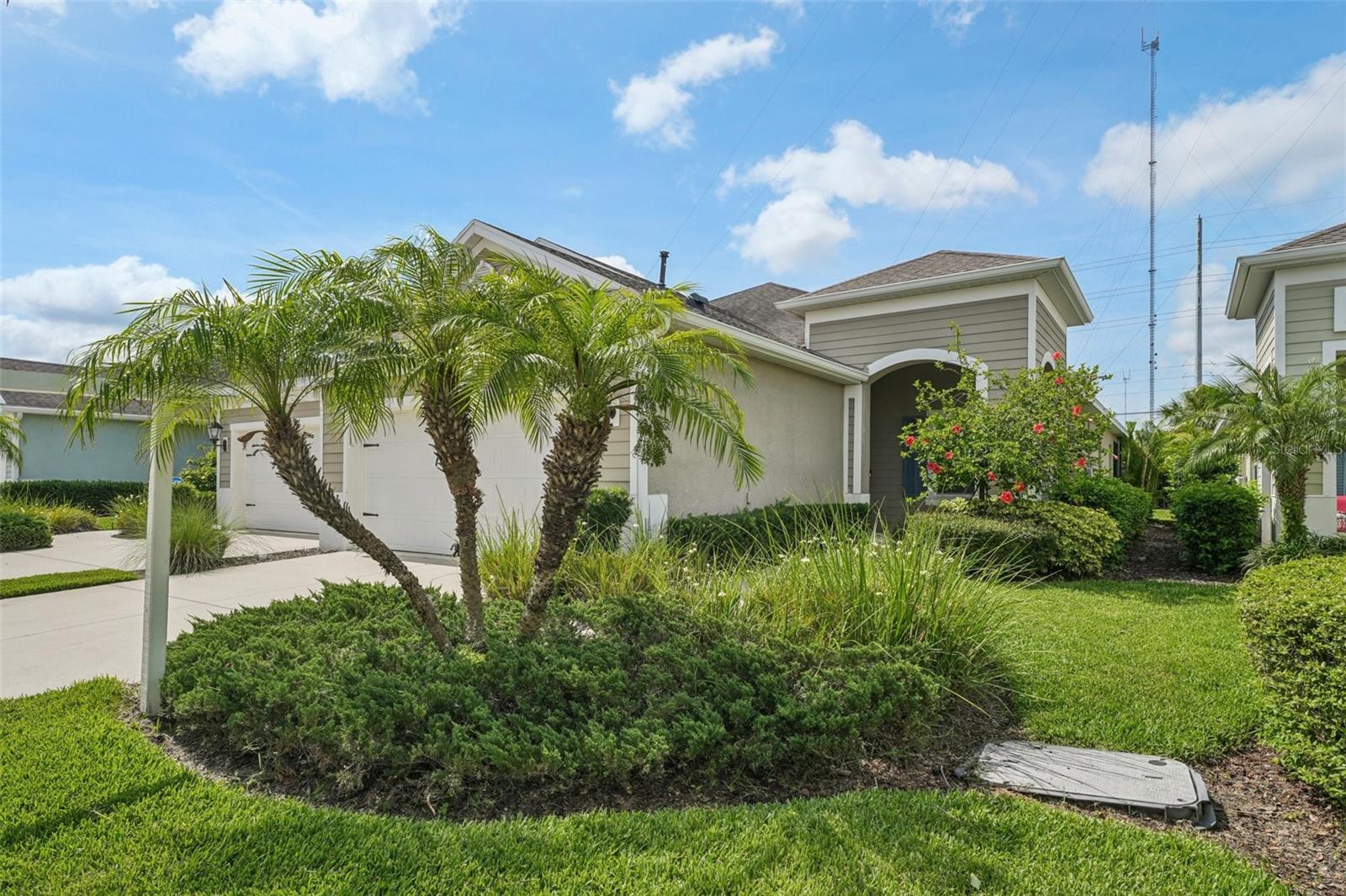 Curb appeal galore in this Neal Communities villa home in Fishhawk West. The home features 1,525 sq. ft., 2 bedroom/2 bathrooms plus office/den and an attached 2-car garage. Two-way split plan allows for utmost privacy. Enjoy Florida nights or morning coffee on the covered and screened-in lanai. Conveniently, the great room has fully-opening pocket doors adding additional space for outdoor entertaining. The chef in the family will love the gourmet kitchen with 42" cabinets, stainless appliance package, quartz countertops, enormous island with cabinets and tile backsplash. Trendy tray ceiling and ceramic tile flooring throughout much of the main living areas accents the great room. Master bedroom is spacious and floods with natural lighting. Master bathroom has double vanities, a large walk-in shower and plenty of closet space. Enjoy the amenities Fishhawk West has to offer including resort style club house and pool! It is a cozy community with charming architecture you will appreciate! Fishhawk West is a short drive to the surrounding Fishhawk Ranch area. Easy access to Tampa's many attraction and gulf beaches! And an easy commute to all areas north and south. Please call your agent today to schedule your private showing!