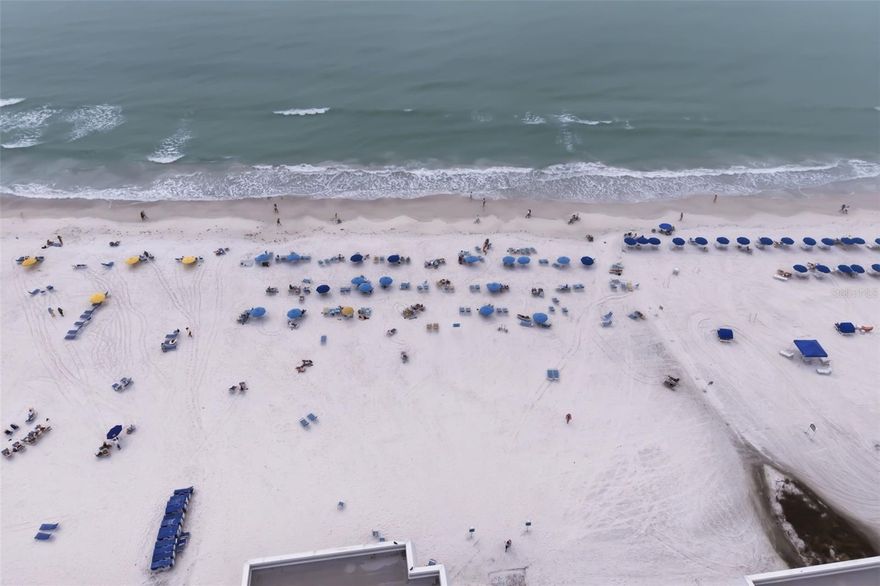 Positioned directly on the sands of world-famous Siesta Key, this 2-bedroom, 2-bath en-suite condominium offers the perfect blend of personal getaway and income-producing investment. Fully furnished and thoughtfully configured for vacation living, this residence is already an active vacation rental with proven historical returns, making it an ideal opportunity for buyers seeking a property that can help offset ownership costs while providing their own beachfront retreat. Inside, tile flooring throughout creates an easy-care coastal interior designed for high-traffic vacation use, while the split layout with two en-suite bedrooms provides privacy and comfort for guests. A large storage closet dedicated to beach gear and recreational “toys” makes it simple to keep everything needed for effortless days on the sand. From the residence, enjoy views of the Gulf of Mexico and the convenience of direct walk-out access to Siesta Key’s powdery white beach, where beach chairs are available for guests, perfect for owners and vacation renters alike. The location places you in one of the most desirable areas of the island, within walking distance to nearby restaurants, shops, and local favorites, or simply hop on the Siesta Key trolley for easy access up and down the island. With its prime beachfront setting, turnkey furnishings, and established rental performance, this property presents a compelling opportunity to own a slice of Siesta Key that can generate income while serving as your personal coastal escape.