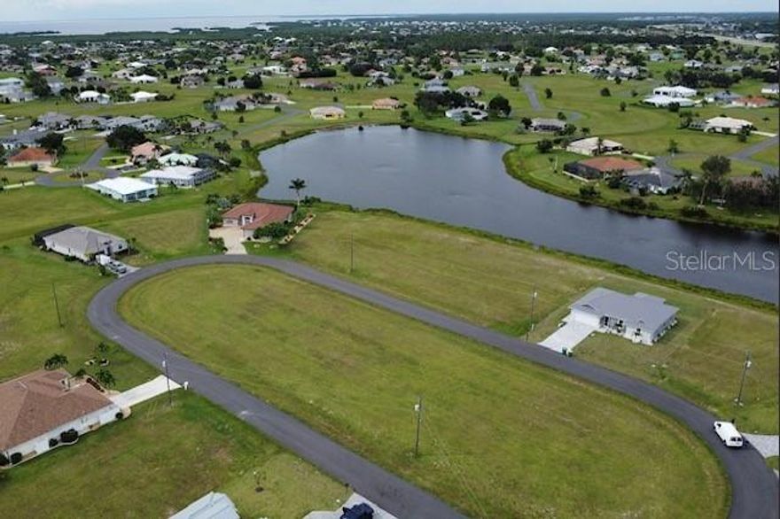 Here is the perfect lot for you to build your dream home, amazingly located off Burnt Store Rd in the quiet community of Burnt Store Lakes close to restaurants and shopping. Pick between southwestern or northeastern exposure. Take your golf cart to the first hole. Adjacent lot is 17471 Vellum Cir is for sale, seller wants package purchase. Seller will consider Financing depending on short terms, offer and qualified Buyers. Burnt Store Lakes is a beautiful deed-restricted community with many new construction homes currently being built throughout the community. As a Burnt Store Lakes resident, you can leisurely kayak on the lakes and enjoy the multitude of tropical birds and wildlife that share this naturalistic setting! Enjoy Burnt Store Lakes' amenities of park with playground or the new kayak/canoe launch which leads to Charlotte Harbor where you easily observe the wildlife. Golf, Marina, Activity Center, Fitness Center and Restaurants can be enjoyed at next door neighboring Burnt Store Marina, which is SW Florida's immediate harbor access, full service, deep water marina. With Burnt Store Road widening to four lanes, downtown Punta Gorda is easily accessible and there you will find a plethora of in-town activities, restaurants and convenience to enjoy.