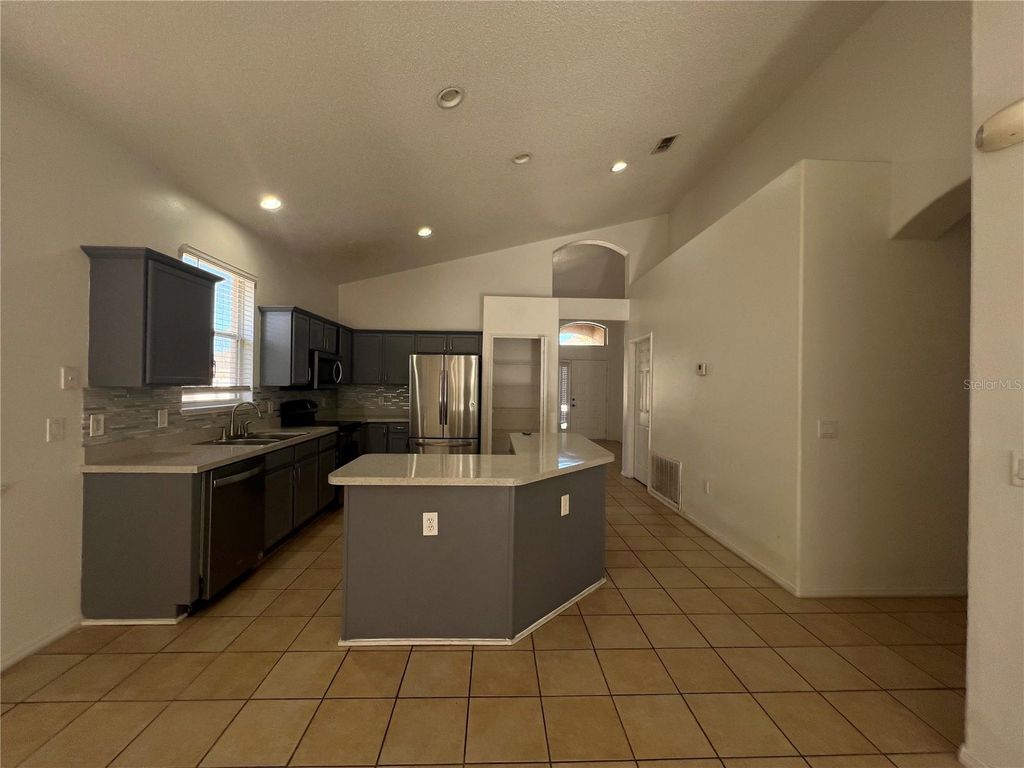 Photo of 617 Lake Biscayne Way, Orlando, FL 32824 (MLS # O6381297)