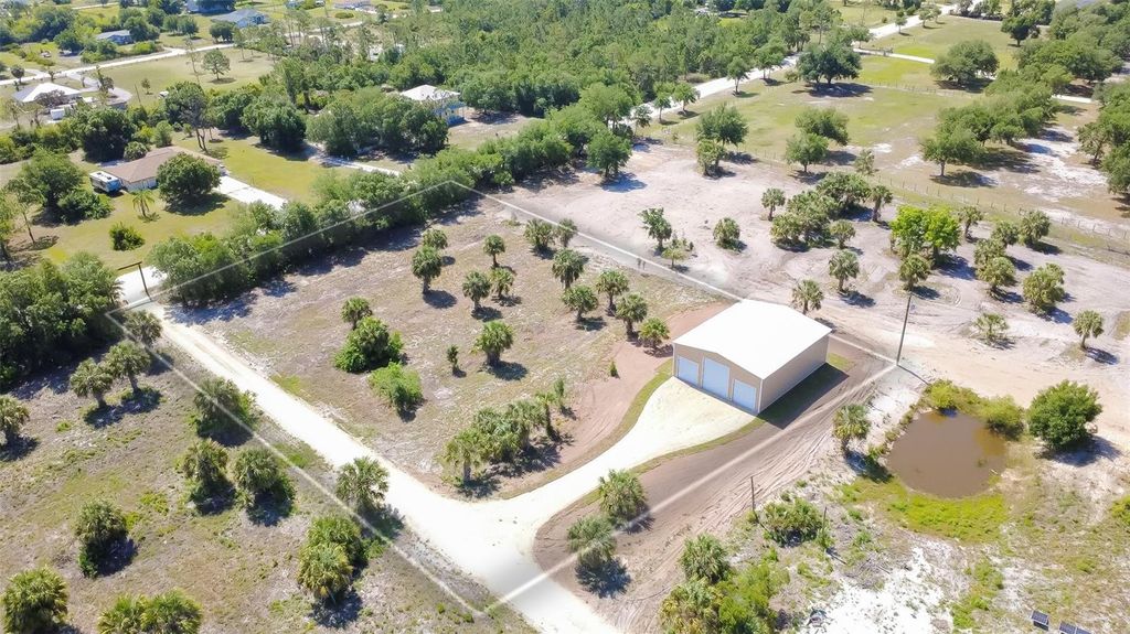 Photo of 6041 Grove Boulevard, Punta Gorda, FL 33982 (MLS # C7525871)