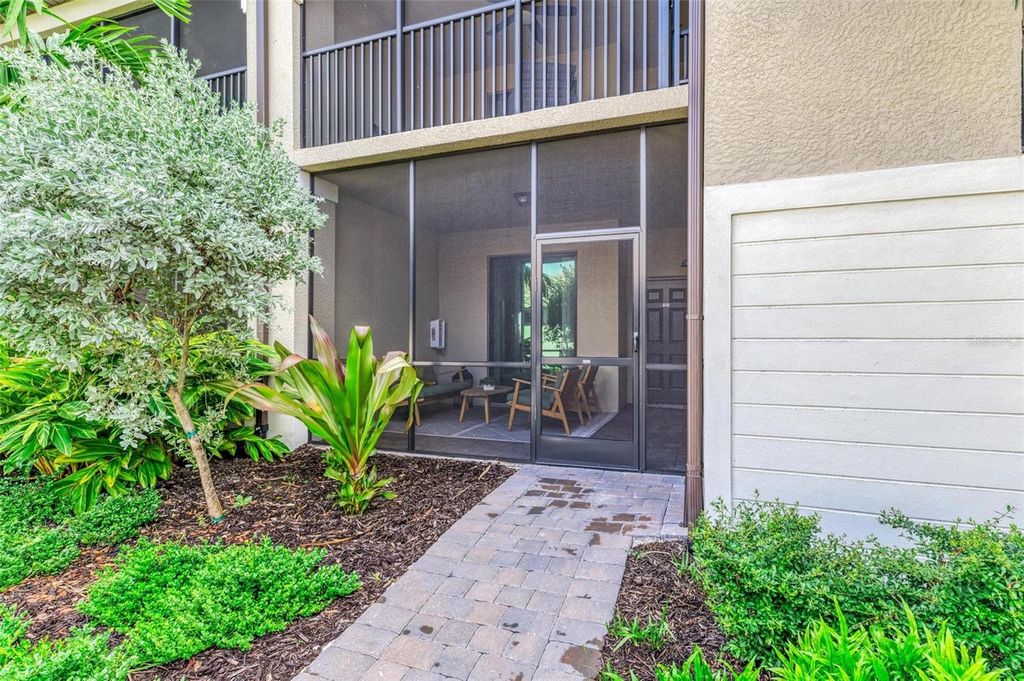 Photo of 5685 Palmer Circle #105, Bradenton, FL 34211 (MLS # A4681378)