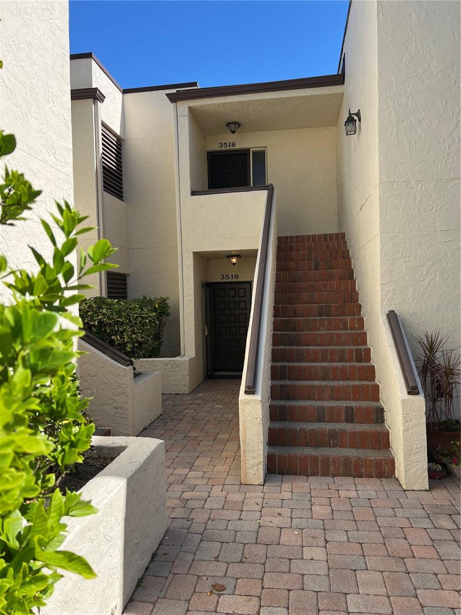 FOR RENT....Two bedroom, two bathroom condo located in the sought after Sarasota community of The Meadows and ready for a short term rental. Walking inside, you are greeted by a well-lit and furnished living/dining room with loads of natural light, and all of Florida's beautiful greenery just outside the many large windows. The kitchen has lots of cooking/preparing space with plenty of cabinets and countertops. The primary bedroom has a king sized bed, with a built in closet as well as a walk in closet just in the hallway and an en suite bathroom with a stall shower. The guest bedroom also has a king sized bed. The guest bathroom has a tub/shower combination. Laundry closet located in the condo. Being one of the oldest communities in Sarasota, The Meadows offers an incredible amount of walking trails, old growth, and peace and quiet. You'll have access to the community pool, walking trails, restaurants, a playground, fitness stations and much more. One assigned parking space.