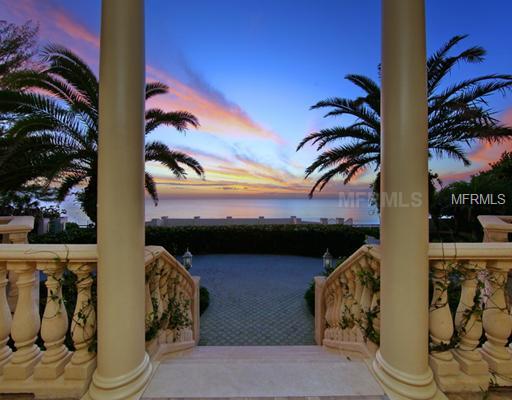 Perhaps the strongest value on the West Coast of Florida! This beautifully designed home is perfectly sited on 2.07 acres of the finest Gulf to Bay available on the privileged and exclusive north end of Casey Key. Walking beach to the West and rare covered boat dock to the East! Magnificent grounds with specimen trees. This estate has it all: regulation tennis court, expansive bayside and gulfside terraces, summer kitchen, fabulous lap pool and spa, separate two bedroom guest house, staff quarters, garage for a fleet of cars, wine cellar,billiard room and home theatre. The elegant gulffront living room with stone fireplace and formal dining room entertain grandly. The remarkably well-designed and well-equipped kitchen opens ideally to casual bayfront dining area and bay front family room. Large and sumptuous master suite with bayside terrace, morning kitchen, his and her baths. Four childrens' suites open to large area for play and study. A very private personal resort for family, friends and gracious living. New roof in 2013. All new Pentair pool equipment system.