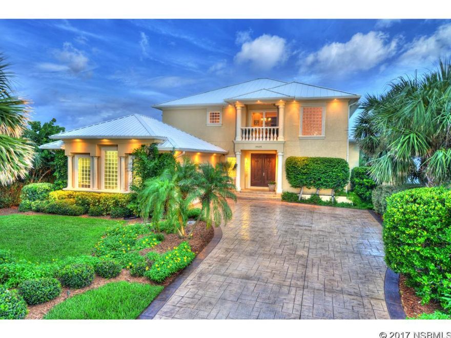 Price reduced to current certified appraisal.Stunning ocean front home on NO DRIVE beach. Providing superb construction rarely seen in oceanfront homes today. Located in historic Ponce Inlet just over an hour from Orlando, 4.5 hours to Miami & 15 minutes to the World's Most Famous Beach. Built in 09 by Scott McCarthy this custom home offers many outstanding features: concrete block from the bottom to the top filled with concrete & with solid poured concrete columns, beams & balconies, augured piling foundation system of home & garage has 35ft pilings/4ft x 4ft concrete collar with steel, turtle friendly & tinted high impact hurricane windows, exterior turtle friendly lights, new metal roof installed with stainless steel screws. 500 gallon propane gas for water, kitchen gas cook-top, fireplace & fire pit, wired & ready for elevator installation, 1,500 gallon cistern, 2 newer heat pump AC systems, climate controlled wine cellar, heatilator gas fireplace, generator, aerobic septic system, custom closets & inside laundry room with splash tub. Downstairs is polished travertine flooring & the upstairs offers hardwood flooring, tile & plush carpeting. One bedroom suite downstairs with its own private bath & access to outside covered porch. Three bedrooms upstairs - 2 of them with own private bath. You also have a game room/office upstairs with spectacular views. Owner's suite is expansive with wrap around windows & access to outside balcony. The owner's bath has beautiful granite counters, an over-sized walk-in shower with seat, jetted tub for 2, private water closet with bidet & dual vanities. Plus, an outstanding custom built closet measuring almost 21ft long. The outside covered porches are spacious offering a complete summer kitchen, fire pit & hot tub. Gourmet kitchen offers a gas stove top, full appliance package, granite counters, island, breakfast bar & walk-in pantry. Living room has built-in bookcases & fireplace. Furnishings available on a separate bill of sale. ;Water: City