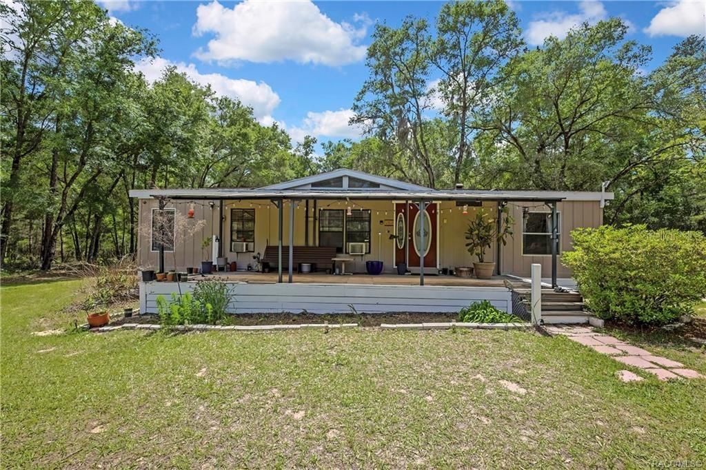 Photo of 27170 Townsend Boulevard, Brooksville, FL 34601 (MLS # OM723049)