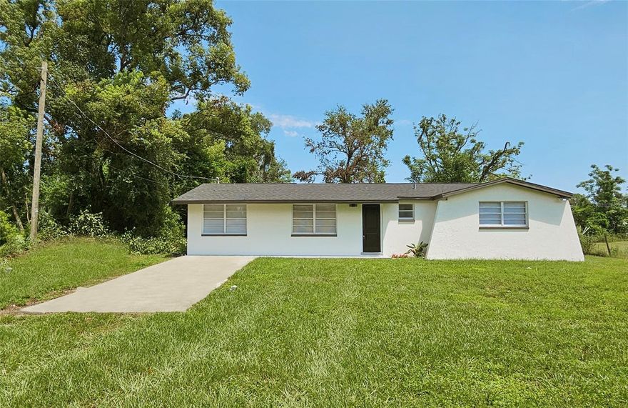 BEAUTIFUL PROPERTY in almost 1 acres!!!! Designated an "Agricultural, Single-Family" district, which is a rural zoning category that supports agricultural and low-density residential uses. , and is meant to maintain the rural character of an area while also allowing for farming and other related uses.
Totally  renovated New roof, AC, fresh interior & exterior paint, all new Ceramic Tile and vinyl floors, updated kitchen and baths.  This property is in an Excellent and convenient location with NO HOA's! Nearby bus stop, close to shopping mall, hospitals, schools, restaurants, parks, easy interstate access to downtown, airport, beaches and many other amenities. Buyer/buyer's agent is responsible for verifying ,room dimensions