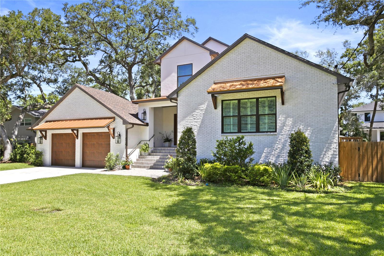 Located in popular South Tampa is where you'll find this immaculate pool home situated on an oversized 92 x 137 homesite. Custom built in 2022, the stunning home features a grand two-story foyer, formal dining with wet-bar, an exceptional eat-in kitchen with Island that opens to the generous family room, first floor owner’s retreat, an office and two bedrooms on the main level. The second floor offers a loft sitting area, two additional bedrooms suites and a generous home theater. Additional amenities include an oversized 26 x 38 car garage with workshop, screened lanai with bath and outdoor kitchen overlooking the privacy fenced yard with pool and putting green. Convenient to Dale Mabry Elementary, Coleman Middle School, little league fields, community tennis, pool and playgrounds.