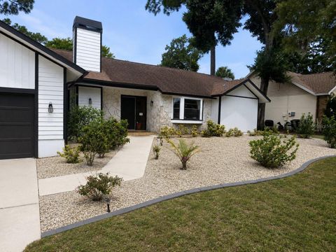Photo of 1382 Sutton Place Drive, Palm Harbor, FL 34683 (MLS # O6415568)