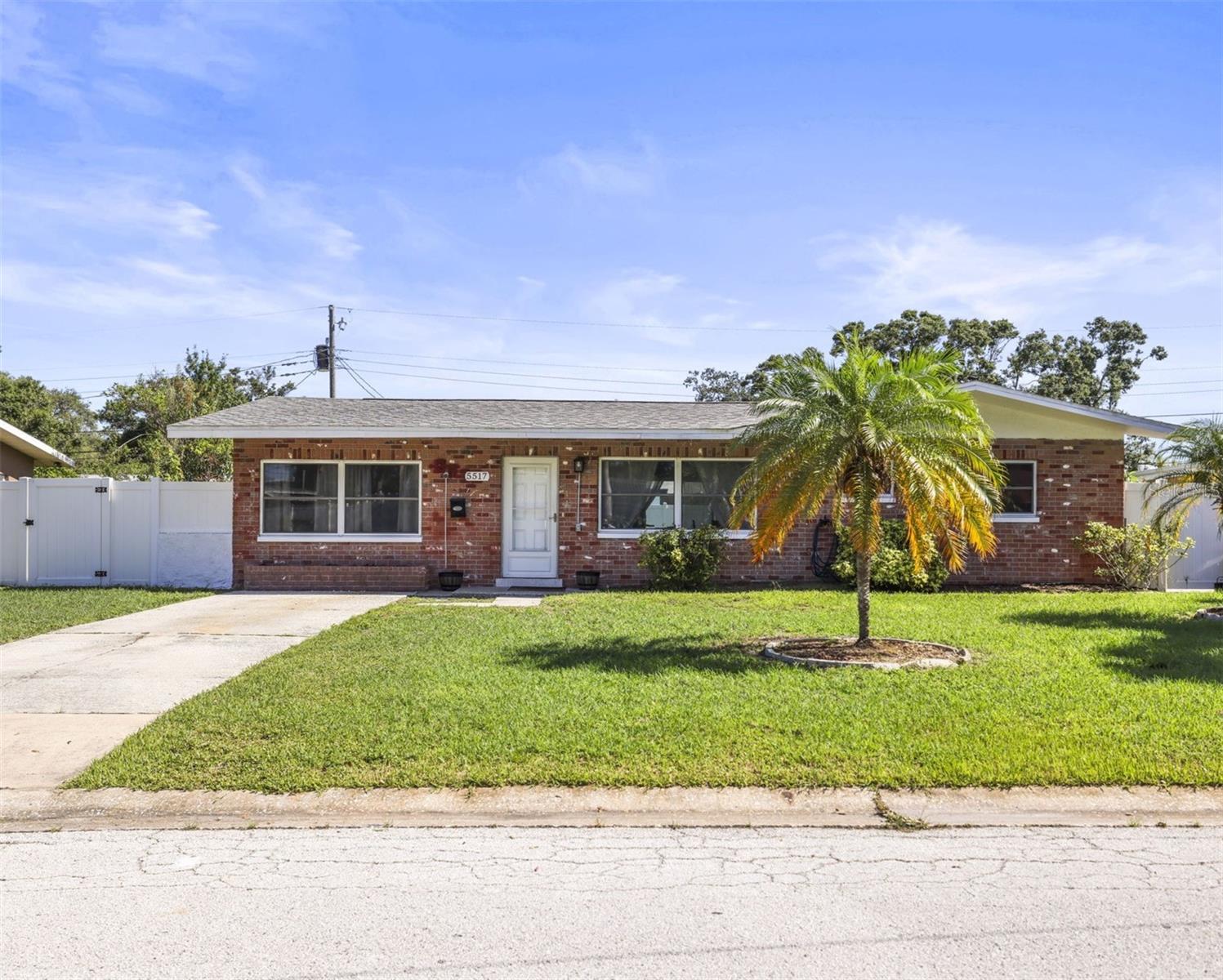 Welcome to this BEAUTIFULLY updated 3-bedroom, 1-bath block home nestled in a quiet and convenient neighborhood of St. Petersburg. Perfectly situated just 15 minutes from vibrant downtown St. Pete and the stunning Gulf beaches, this move-in-ready property offers the ideal combination of comfort, updates, and value. Step inside to discover a warm, inviting interior featuring an updated kitchen equipped with GRANITE countertops, modern cabinetry, and “like new” appliances—perfect for home chefs and entertainers alike. The home boasts tasteful upgrades throughout, including new light fixtures, hardware, and stylish finishes that enhance its bright, welcoming ambiance. The spacious layout includes three well-sized bedrooms and a refreshed full bathroom. Whether you’re a first-time buyer, downsizing, or looking for a solid investment property, this home checks all the boxes. Major system upgrades have already been completed for your peace of mind, including a new roof (2018) and updated plumbing to the main city sewer line (2019)—a significant value add. Outside, enjoy the privacy and security of a fully fenced yard, ideal for pets, play, or weekend gatherings. There is also an ADDITIONAL DRIVEWAY for guests or other toys, making this home versatile for a variety of lifestyles. Located close to major roadways, local parks, shopping, and dining, this home offers the best of St. Pete living with easy access to all the amenities the area has to offer. Do not miss your chance to own this well-cared-for, updated gem in one of the most sought-after regions of the Tampa Bay area. SCHEDULE YOUR PRIVATE SHOWNG TODAY!