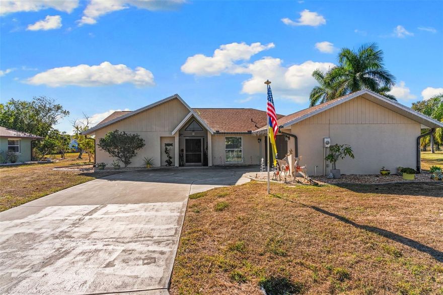 Discover your slice of paradise at 25157 Lahore Lane, Punta Gorda, Deep Creek! This meticulously maintained 3-bedroom, 2-bathroom home offers serene lake views and a host of recent upgrades, making it move-in ready. Enjoy peace of mind with a new roof installed in 2021, a 2021 AC system, new hurricane impact windows, and newer hot water heater all contributing to enhanced energy efficiency and storm protection. Enjoy peace of mind with a X flood zone (no flood insurance required).The heart of the home, the kitchen, has been recently updated with modern finishes, perfect for entertaining or quiet family meals. The primary bedroom and bathroom has also received a stylish refresh, providing a spa-like retreat. Beyond the home's impressive features, its prime location offers unparalleled convenience. You'll be just moments away from a variety of shopping destinations, exquisite dining options, championship golf courses, and the pristine beaches of Southwest Florida. This Deep Creek gem combines comfort, style, and an unbeatable location – don't miss the opportunity to make it yours!