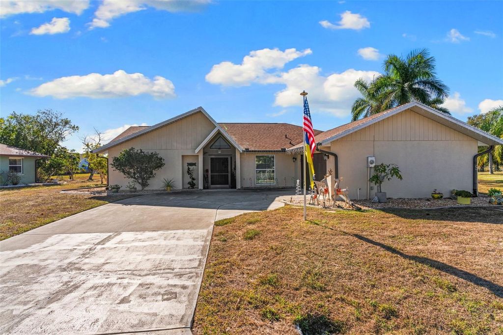 Photo of 25157 Lahore Lane, Punta Gorda, FL 33983 (MLS # A4677120)