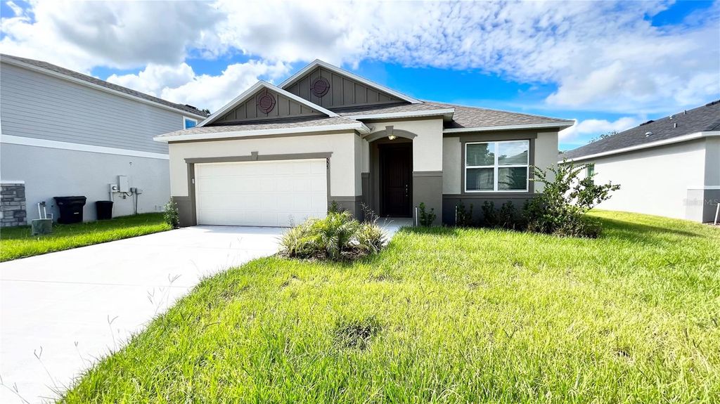 Photo of 557 Scott Lake Creek Lane, Lakeland, FL 33813 (MLS # O6401273)